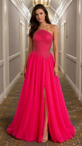 Front view of hot pink strapless beaded tulle evening gown with leg slit