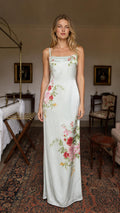Model wearing sage floral print satin slip maxi dress from the front