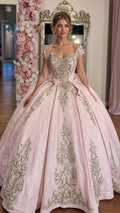Front view of pink off-shoulder ballgown with gold embroidery