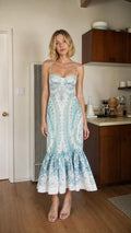 Front view of model wearing Light Blue paisley midi dress