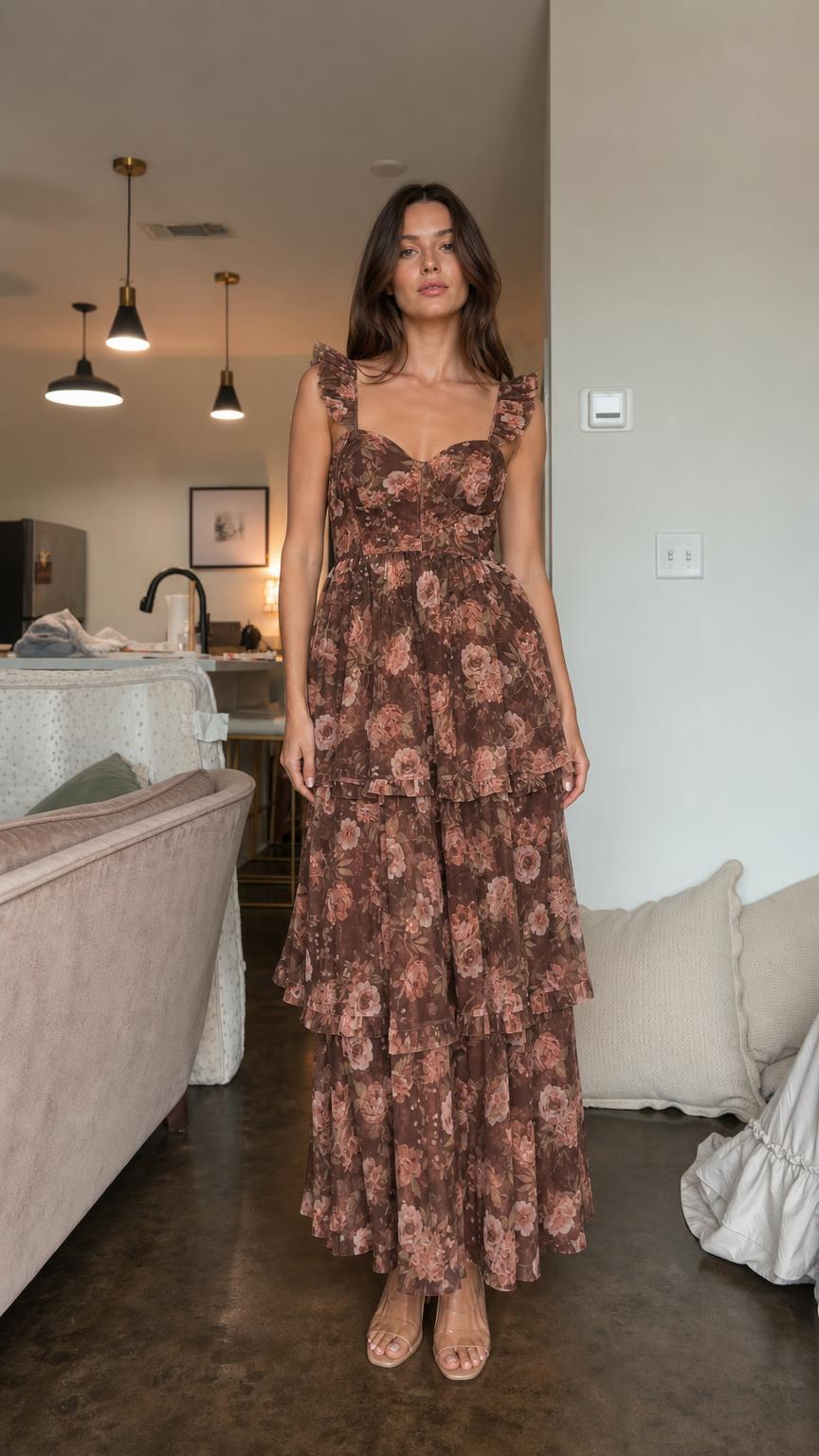 Front view of model wearing brown floral ruffle tiered maxi dress