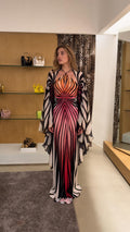 Front view of sunset pink halter maxi dress