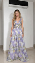 Front view of model wearing lavender floral ruffle strap maxi dress