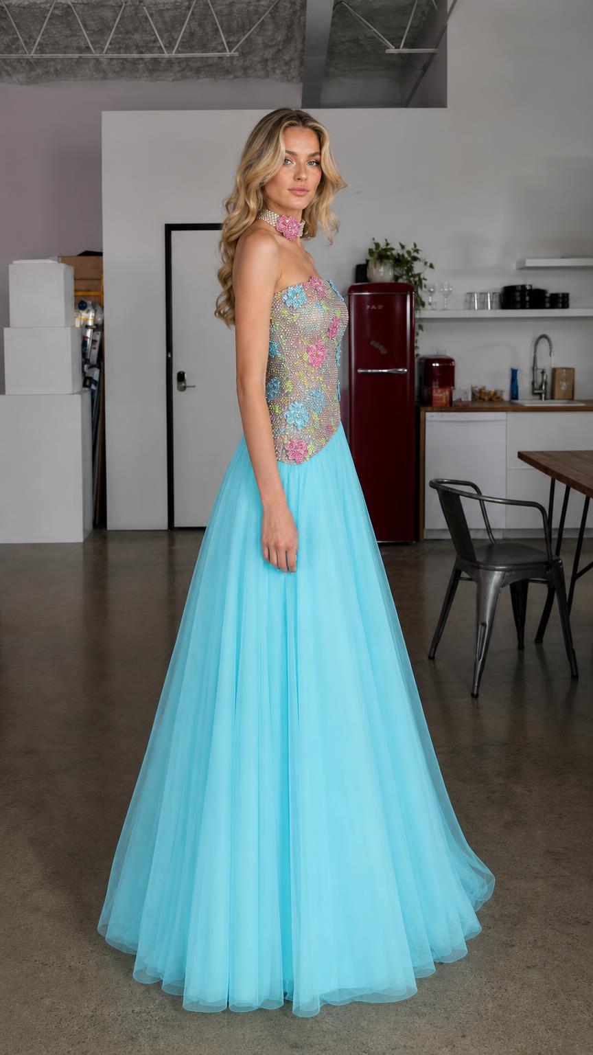 Side profile view of light blue formal tulle gown