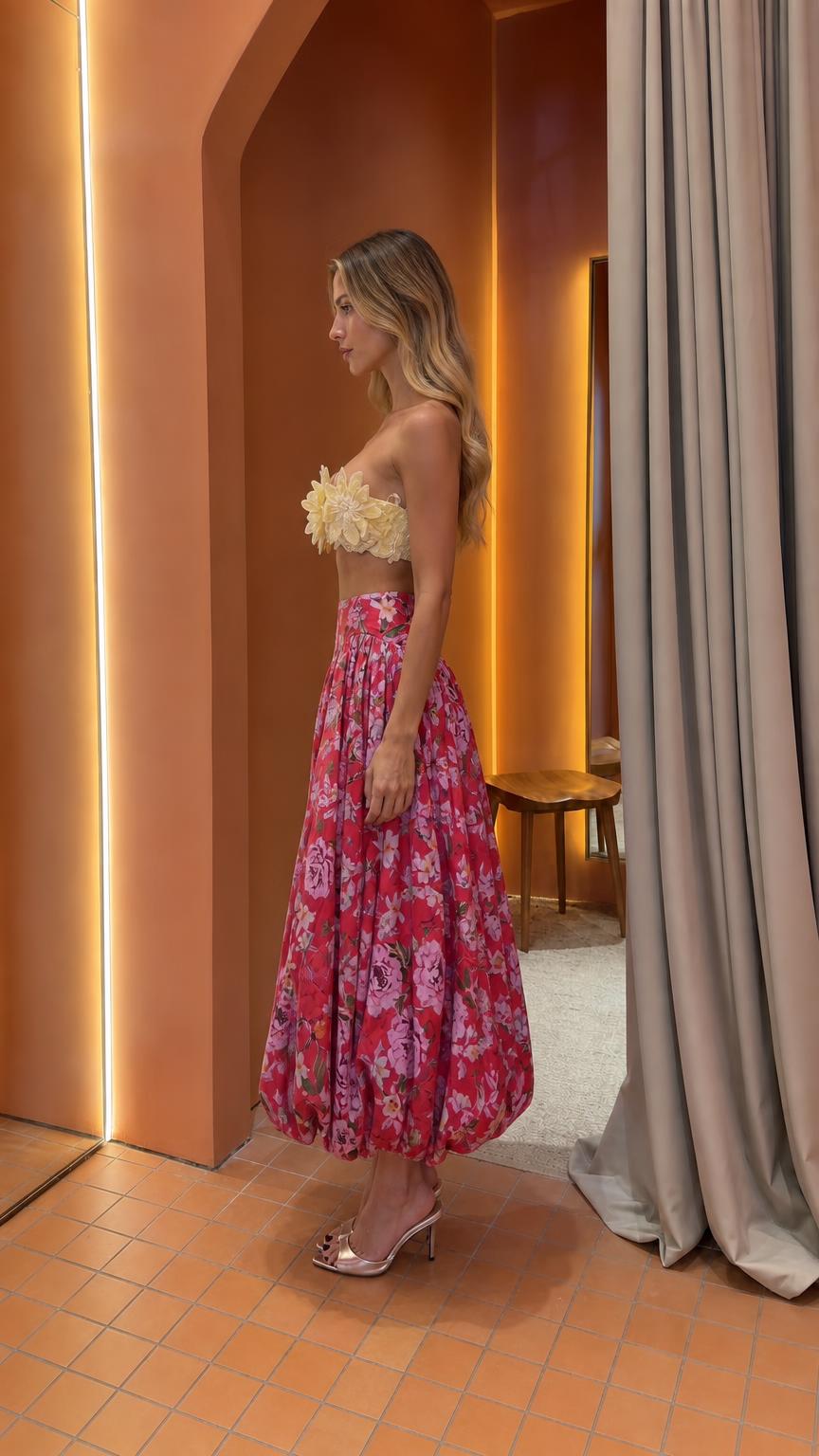 Side view of Red floral balloon midi skirt