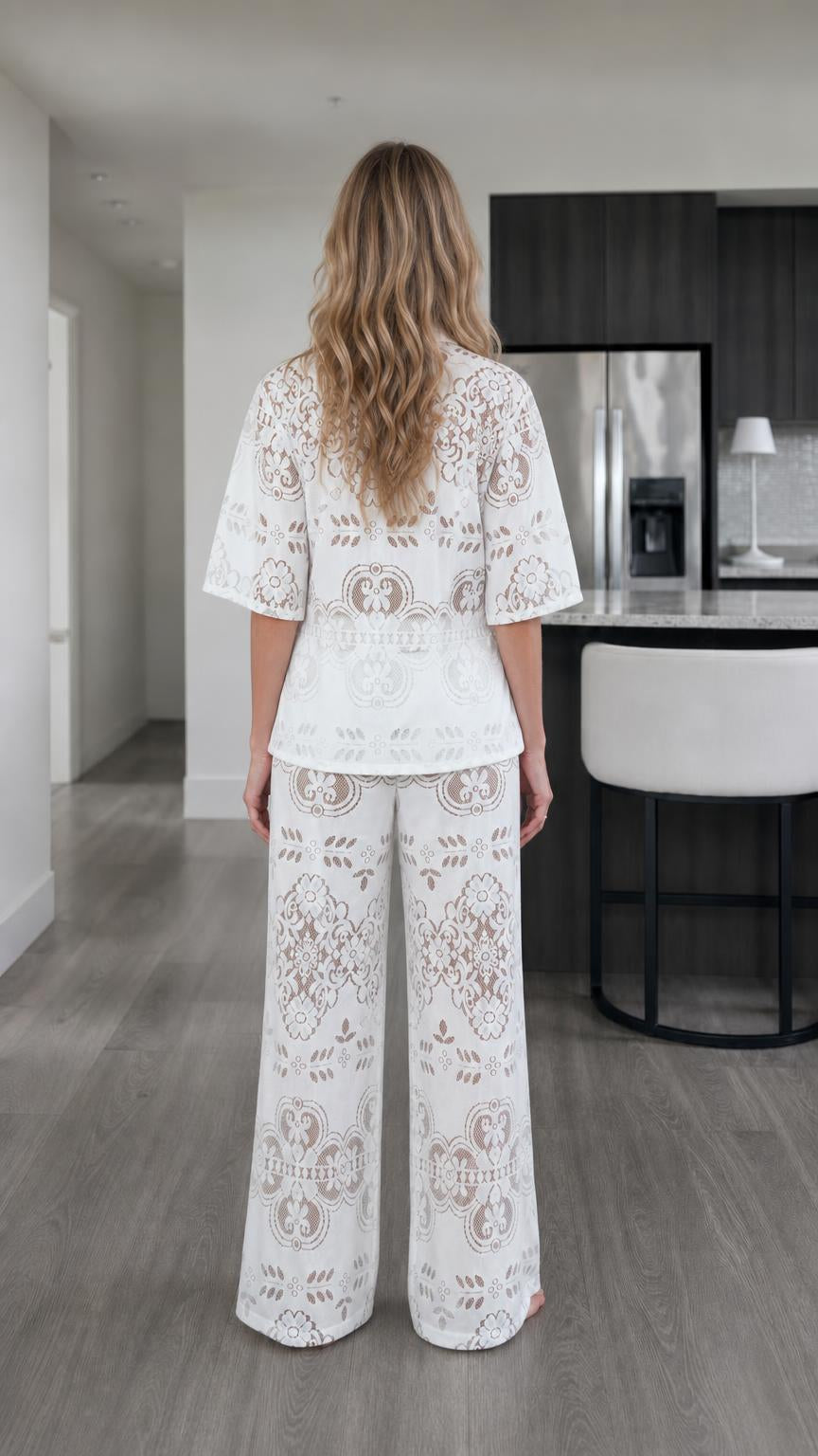 Back view of woman in white lace matching set