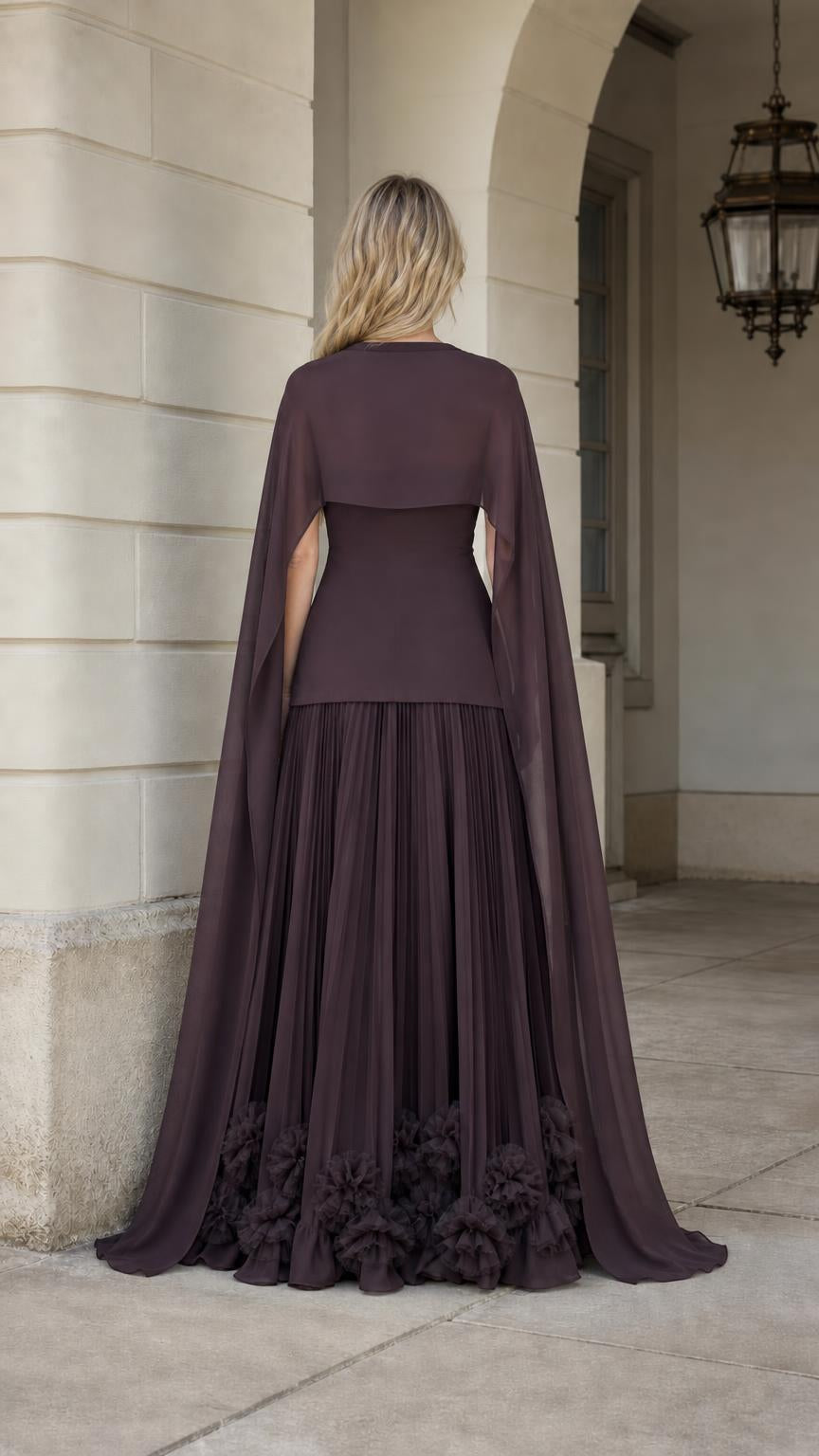 Back view showcasing flowing cape overlay