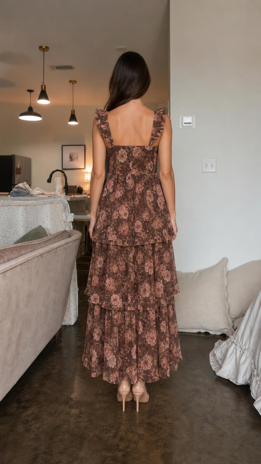 Back view of model wearing brown floral ruffle tiered maxi dress