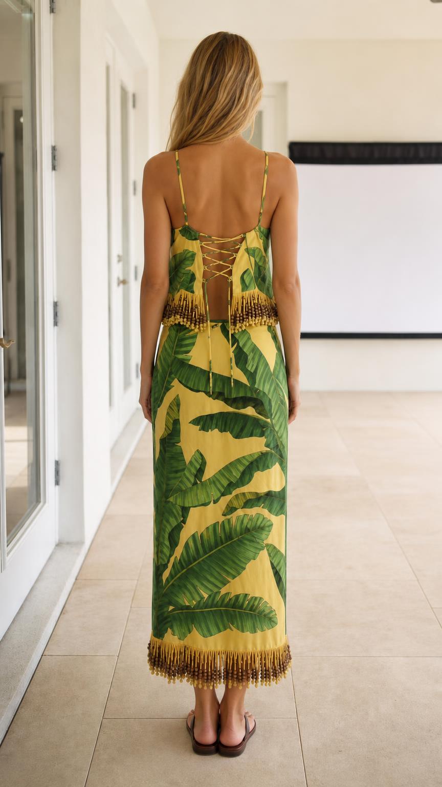 Back view of model showing lace-up back detail on the cami top