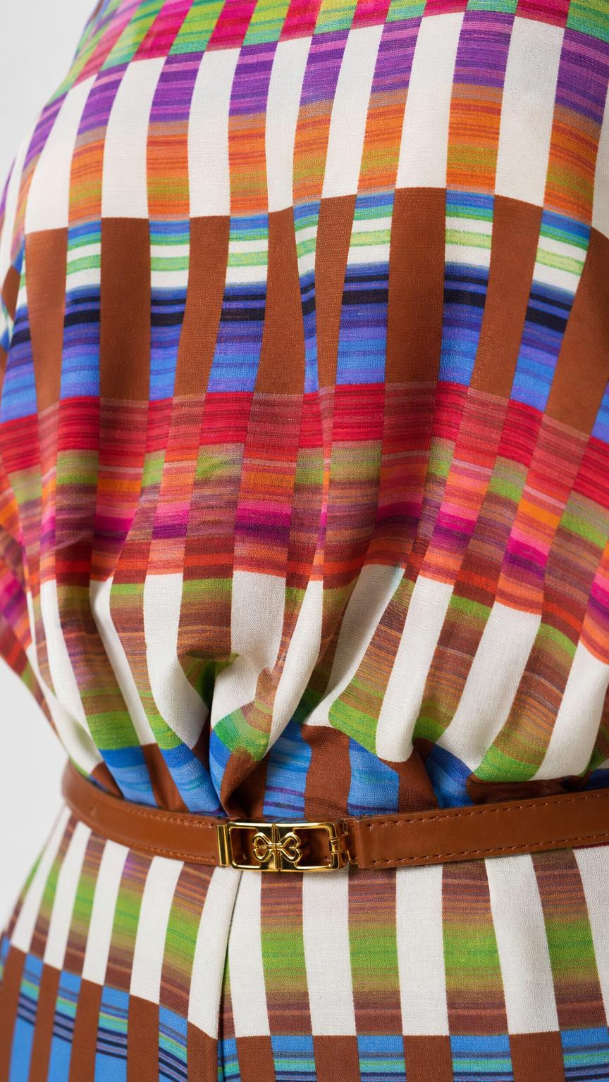 Close-up detail of geometric fabric pattern and waist belt