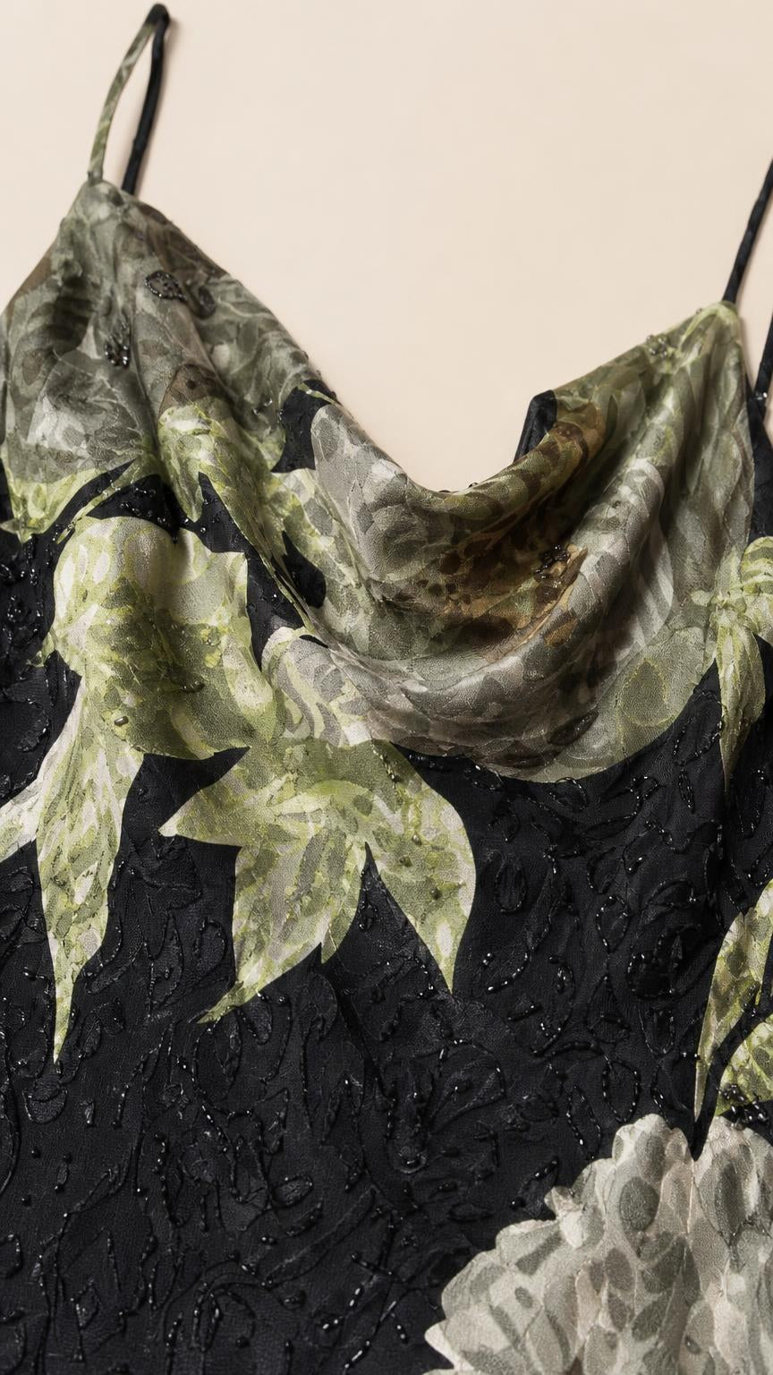 Close-up detail of cowl neckline and floral pattern