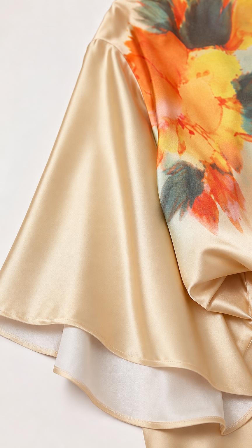 Close-up of satin fabric and floral print detail