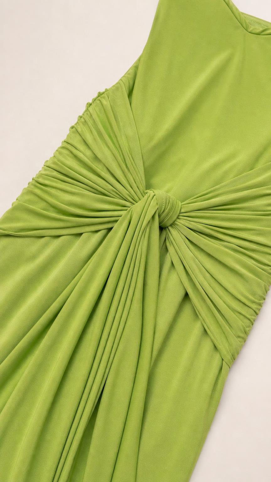 Close-up detail of the front knot and draping texture