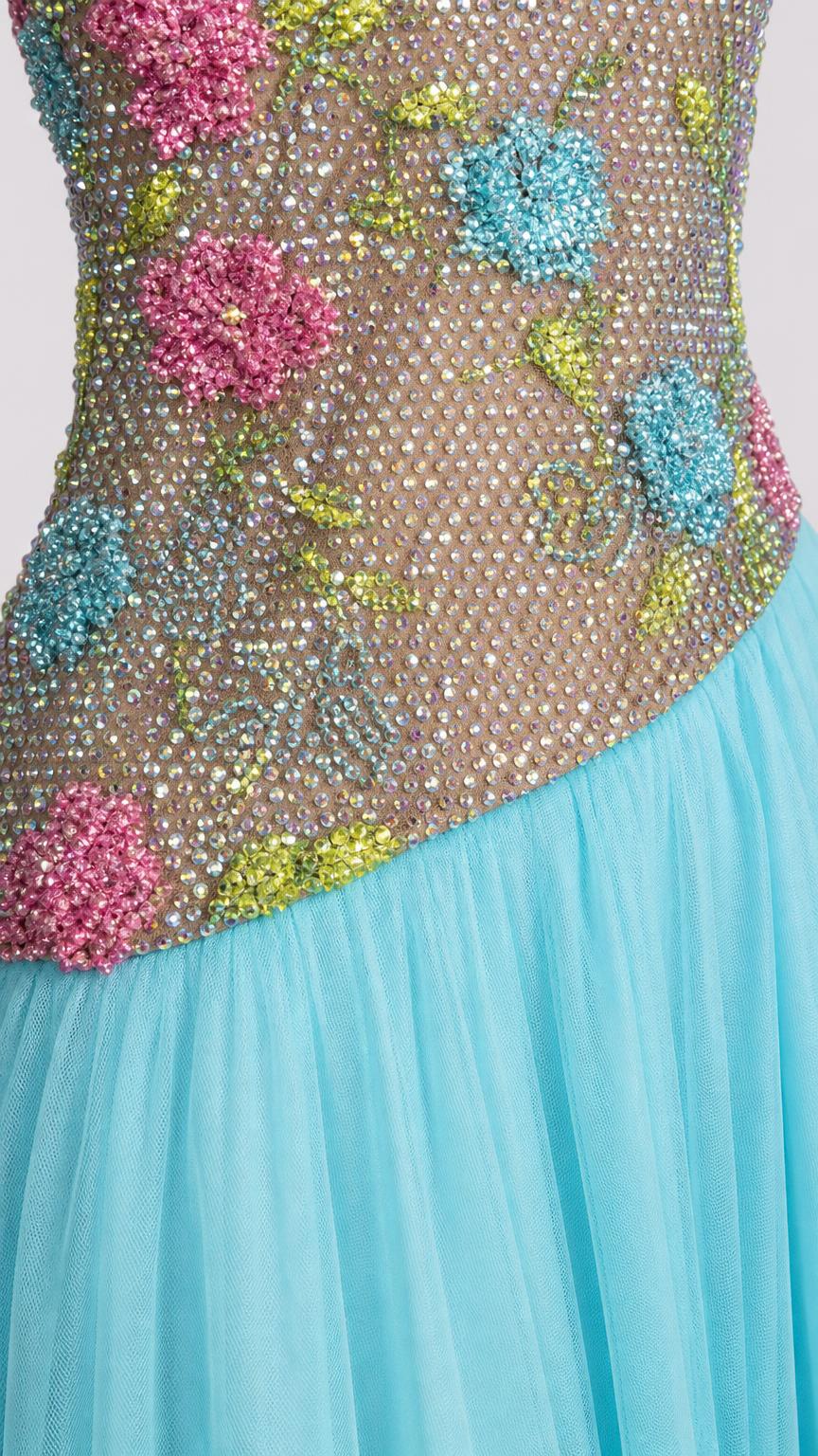 Close-up of beaded and crystal embellished bodice on light blue tulle dress