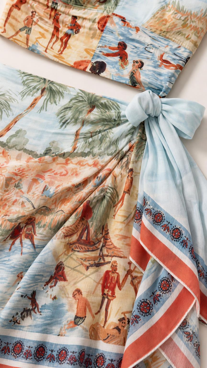 Flat lay detail of fabric and side-tie wrap of the scenic print set