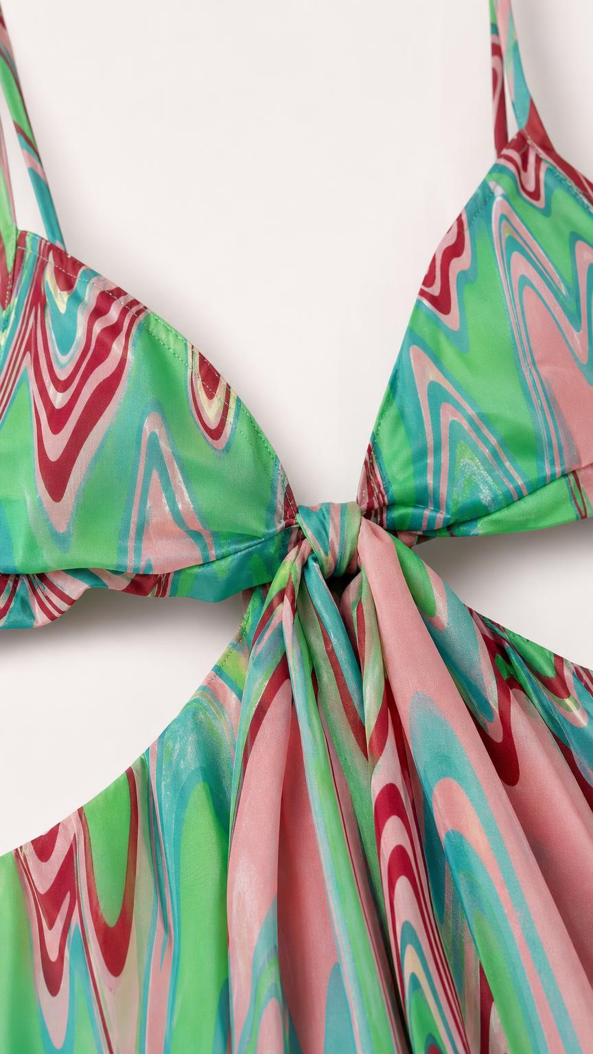 Close-up detail of knotted bodice and cutout styling