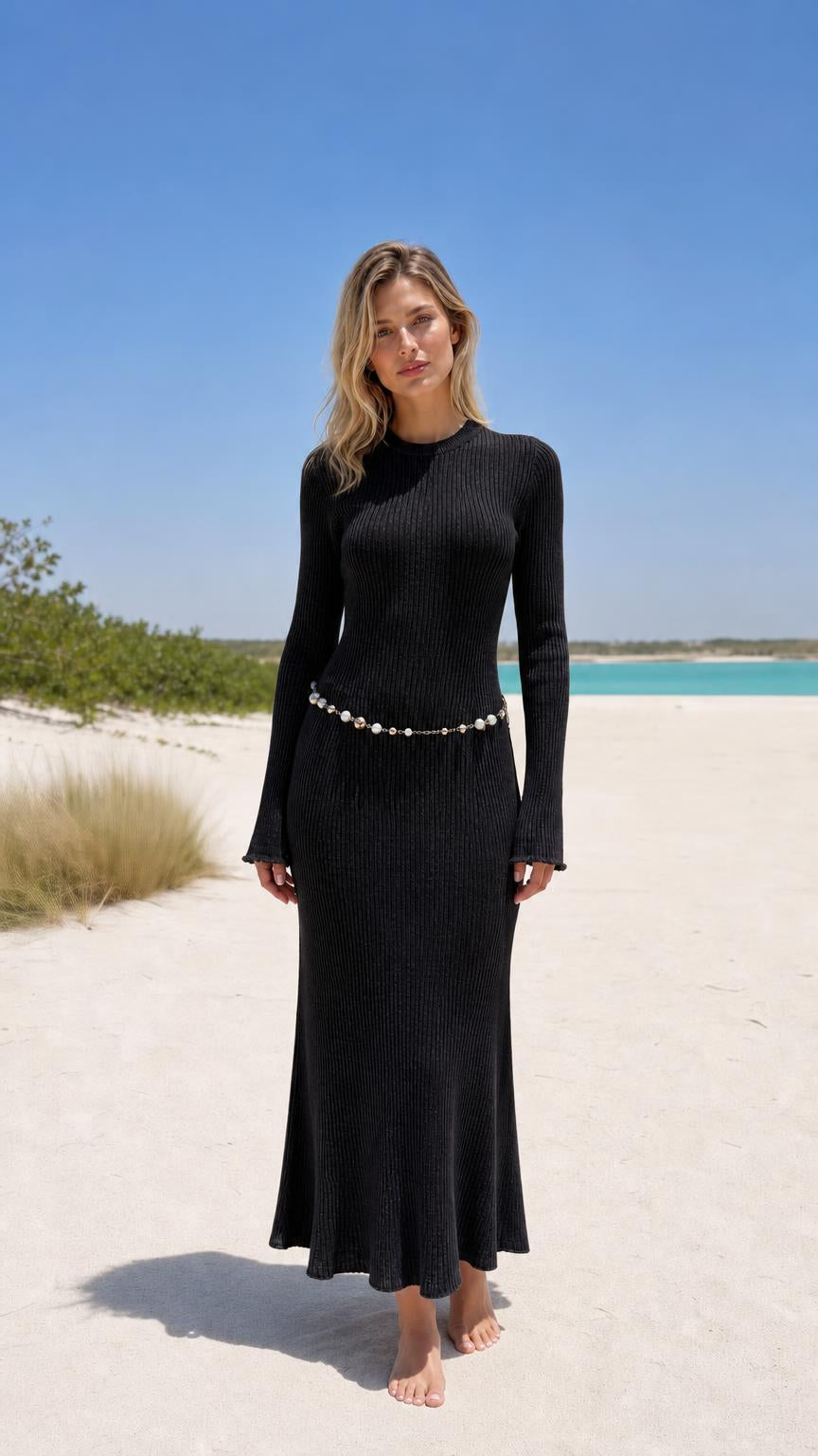 Model wearing black ribbed knit maxi dress