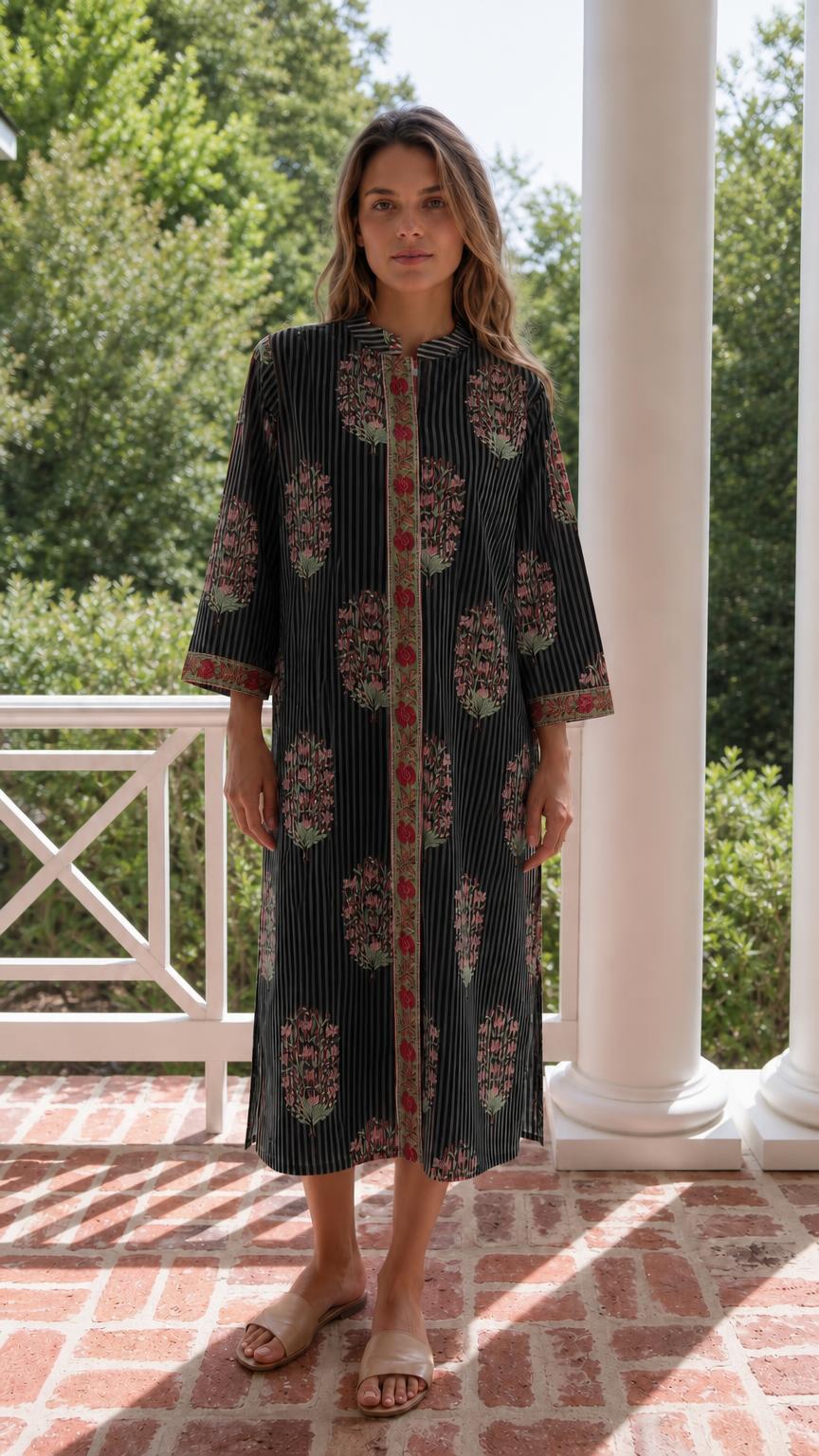 Front view of model wearing black striped floral midi dress