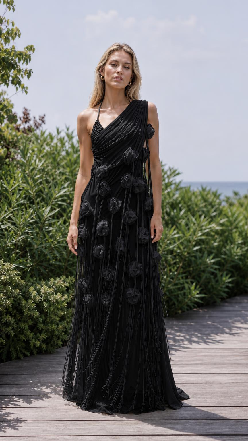 Front view of black one-shoulder floral applique maxi dress