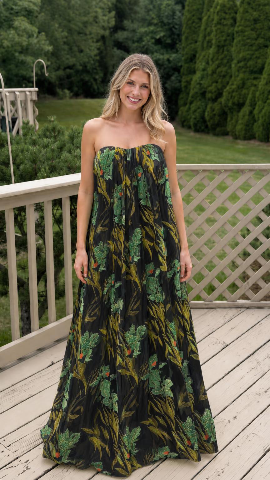 Model wearing black floral strapless maxi dress