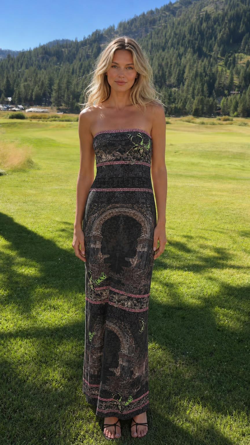 Model wearing black color variant of the strapless maxi dress