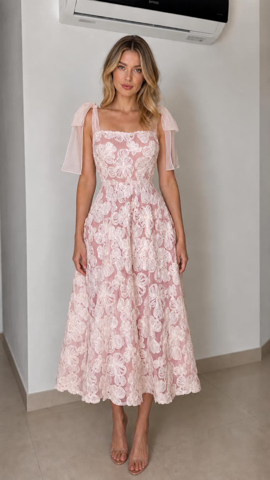 Front view of pink floral applique midi dress