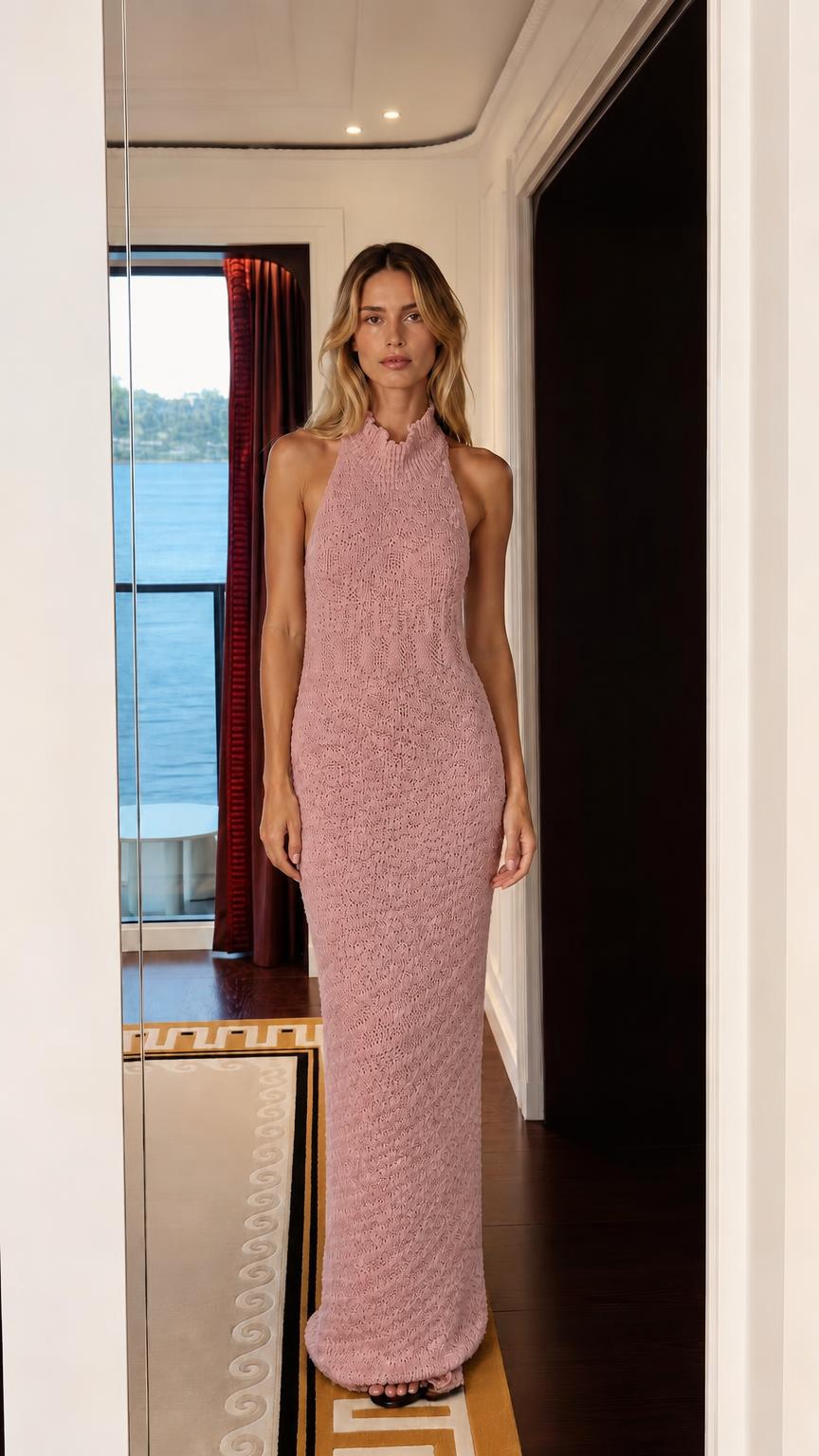 Model wearing pink color variant of mock neck knit maxi dress