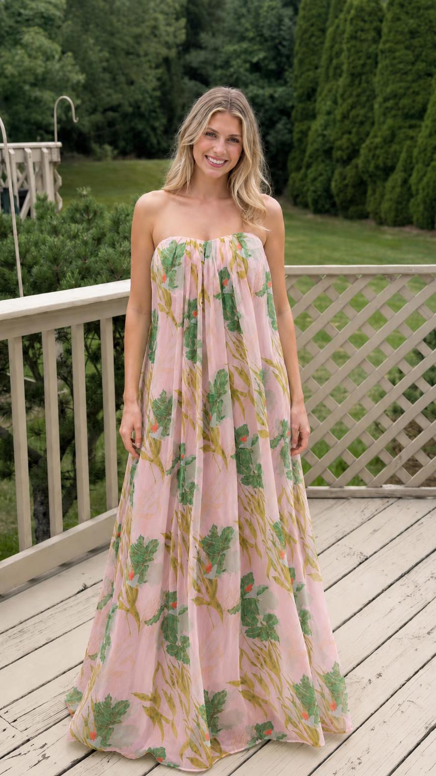 Model wearing pink floral strapless maxi dress