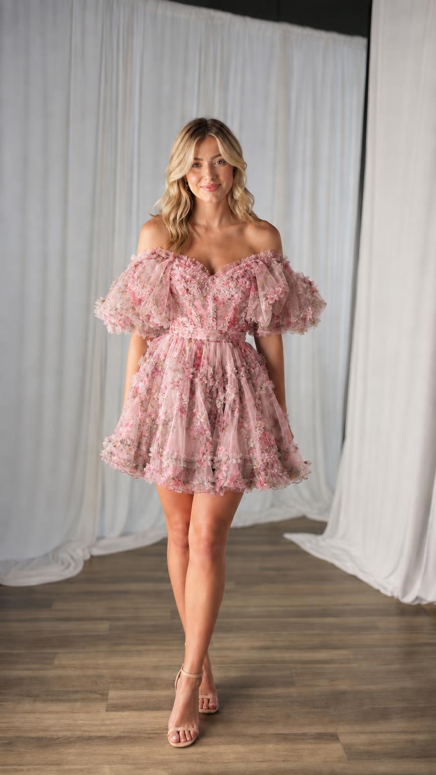 Model wearing pink floral tulle mini dress