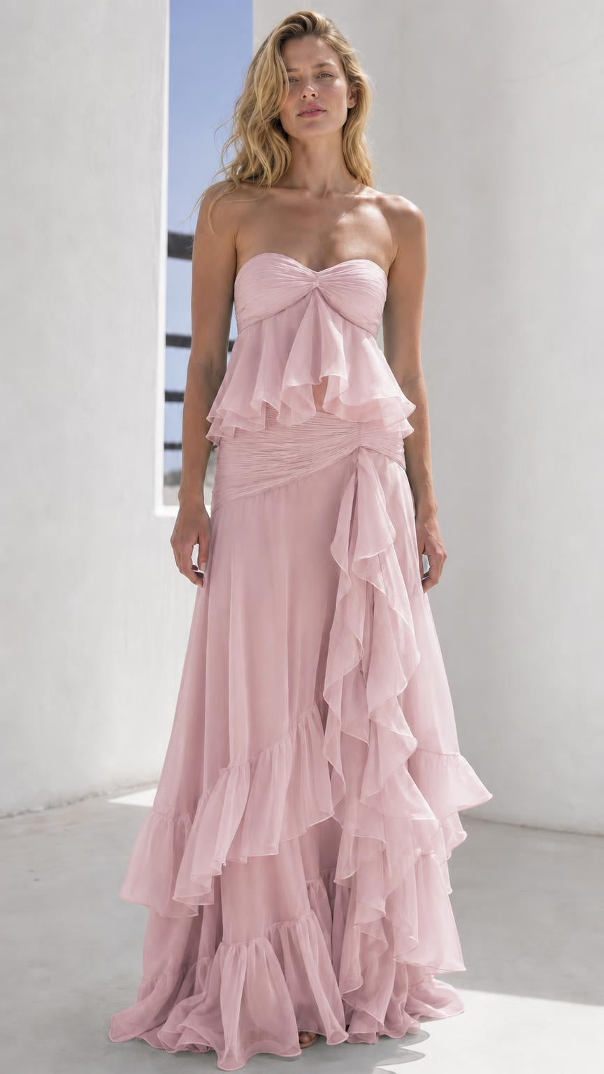 Model wearing pink strapless tiered maxi dress
