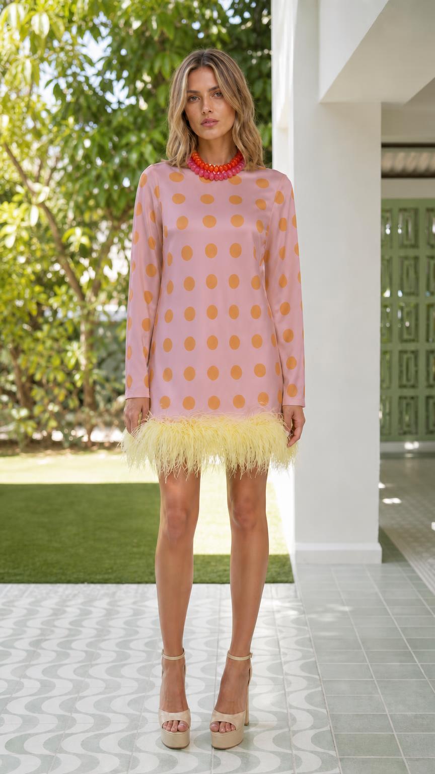 Pink polka dot mini dress with feather hem