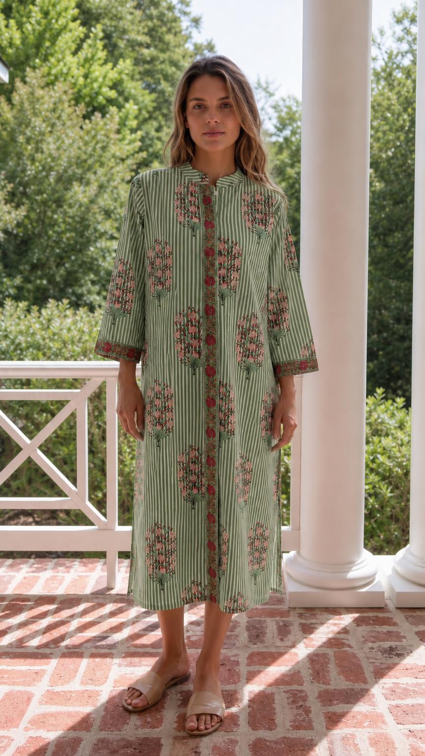 Front view of model wearing sage green striped floral midi dress