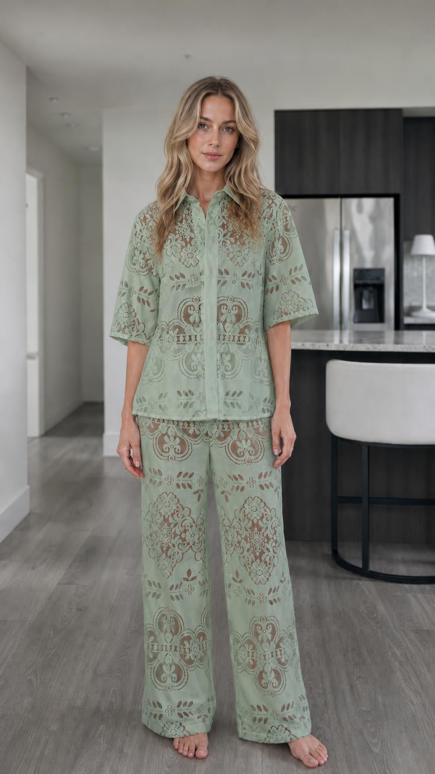 Woman wearing sage green floral lace two-piece matching set