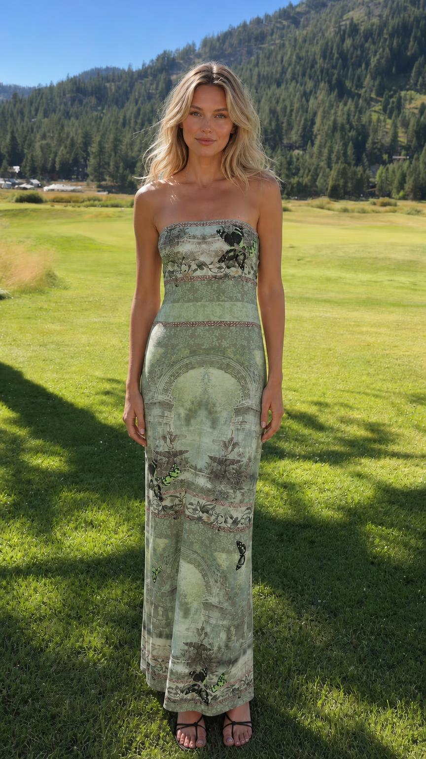 Model wearing sage color variant of the strapless maxi dress