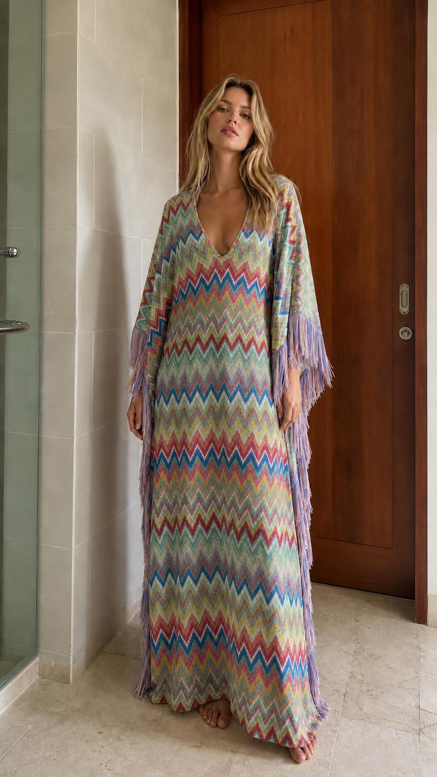 Model wearing blue-based chevron fringe maxi kaftan dress