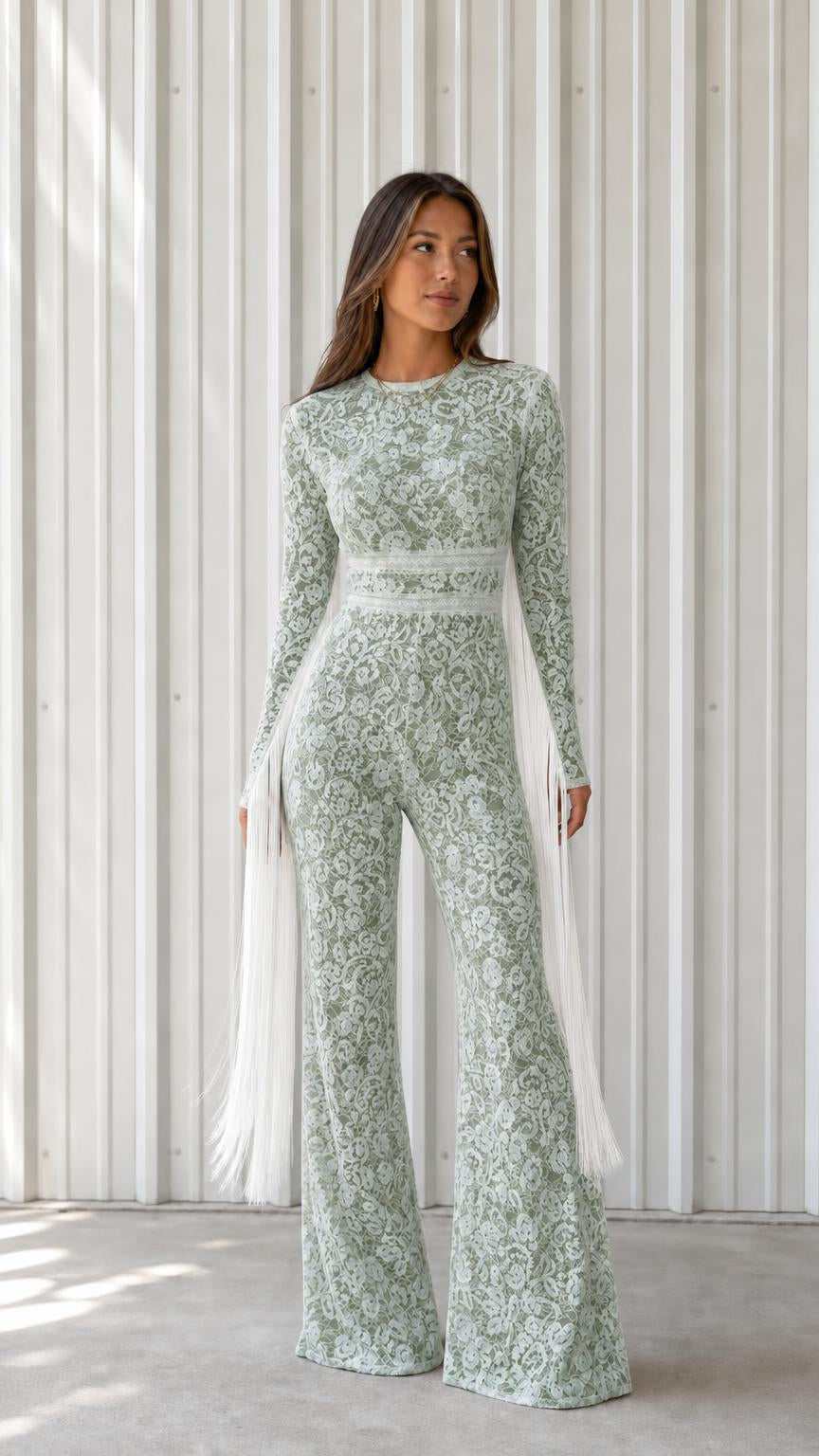 Front view of woman wearing sage green lace long sleeve wide leg jumpsuit