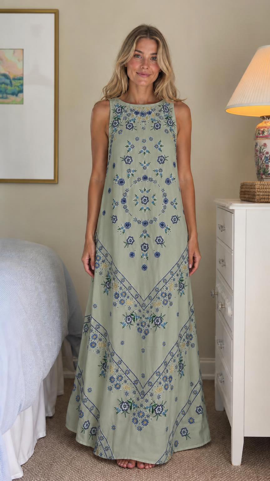 Front view of sage green floral embroidered maxi dress