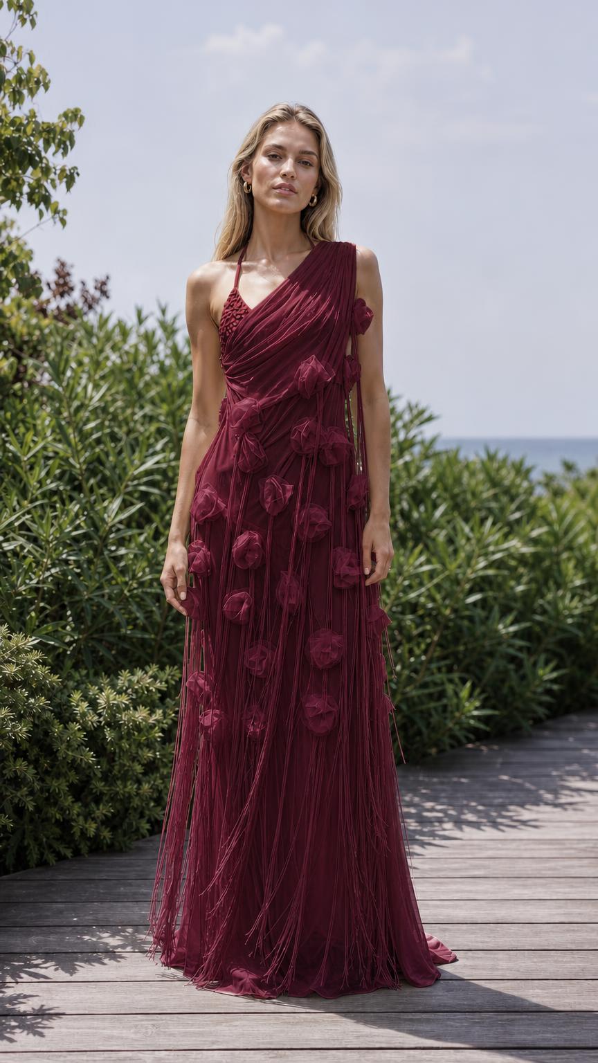 Front view of burgundy one-shoulder floral applique maxi dress