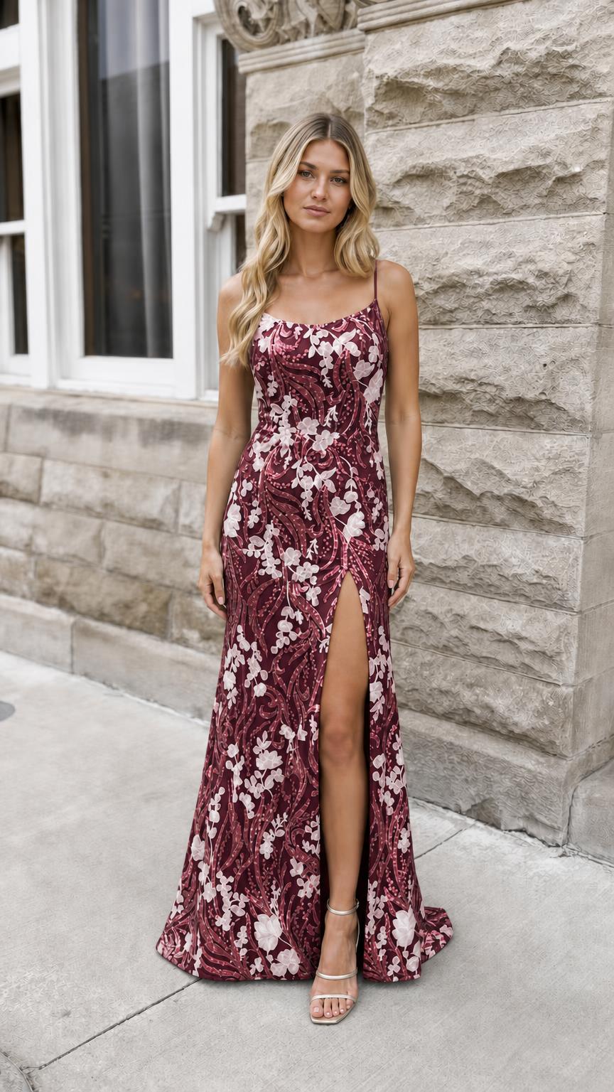 Model wearing burgundy floral print evening maxi dress