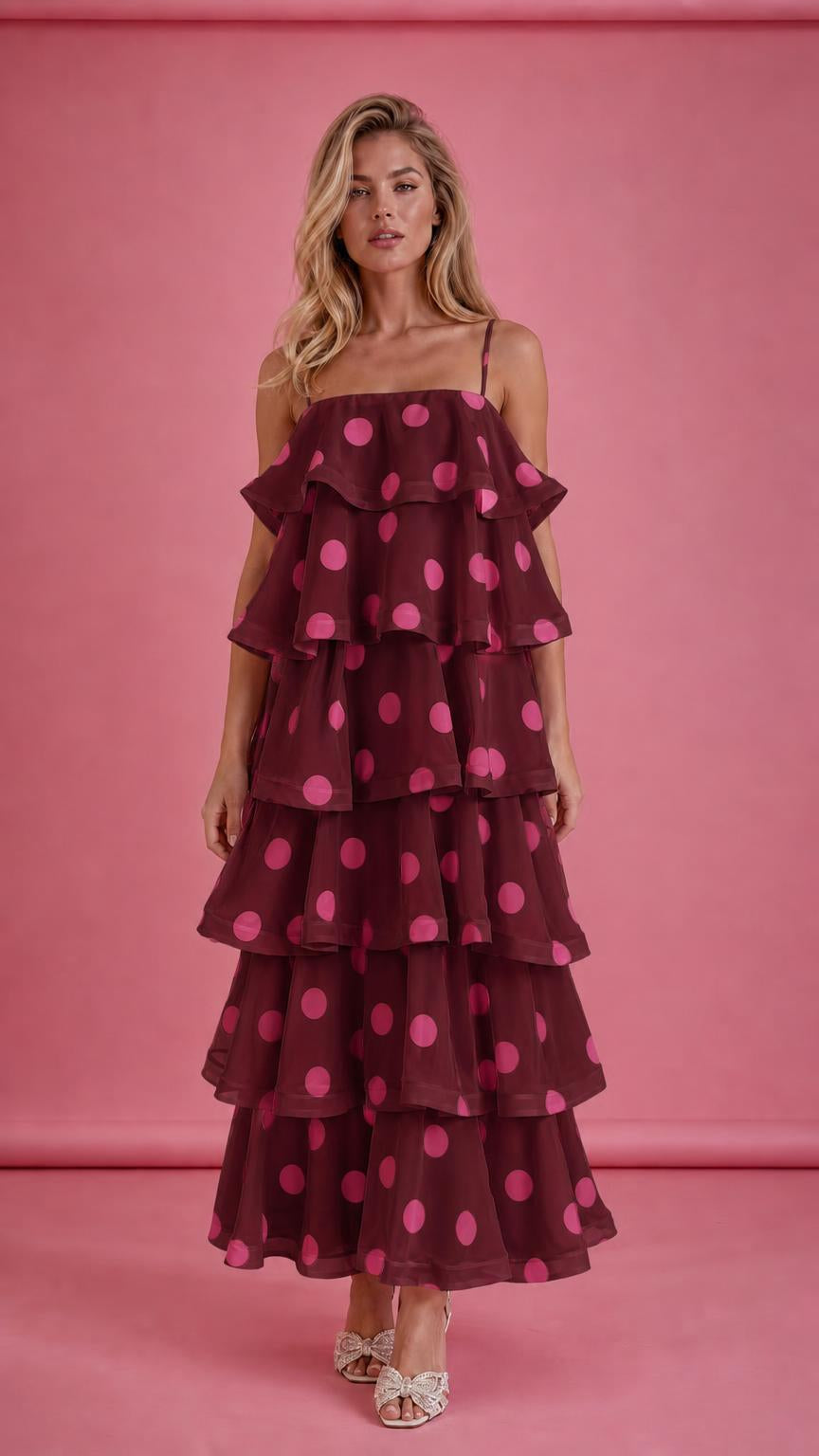 Model wearing burgundy polka dot tiered ruffle midi dress