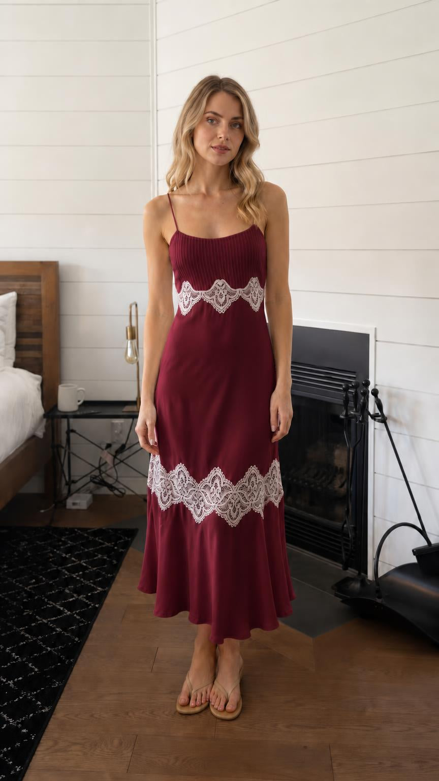 Woman wearing burgundy lace trim pleated slip midi dress