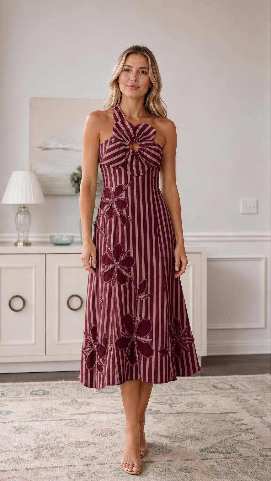 Front view of burgundy striped halter midi dress