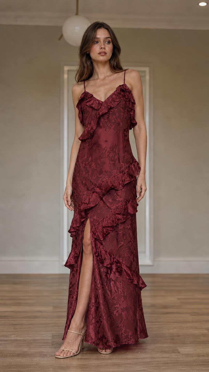 Front view of model wearing burgundy ruffled slip maxi dress