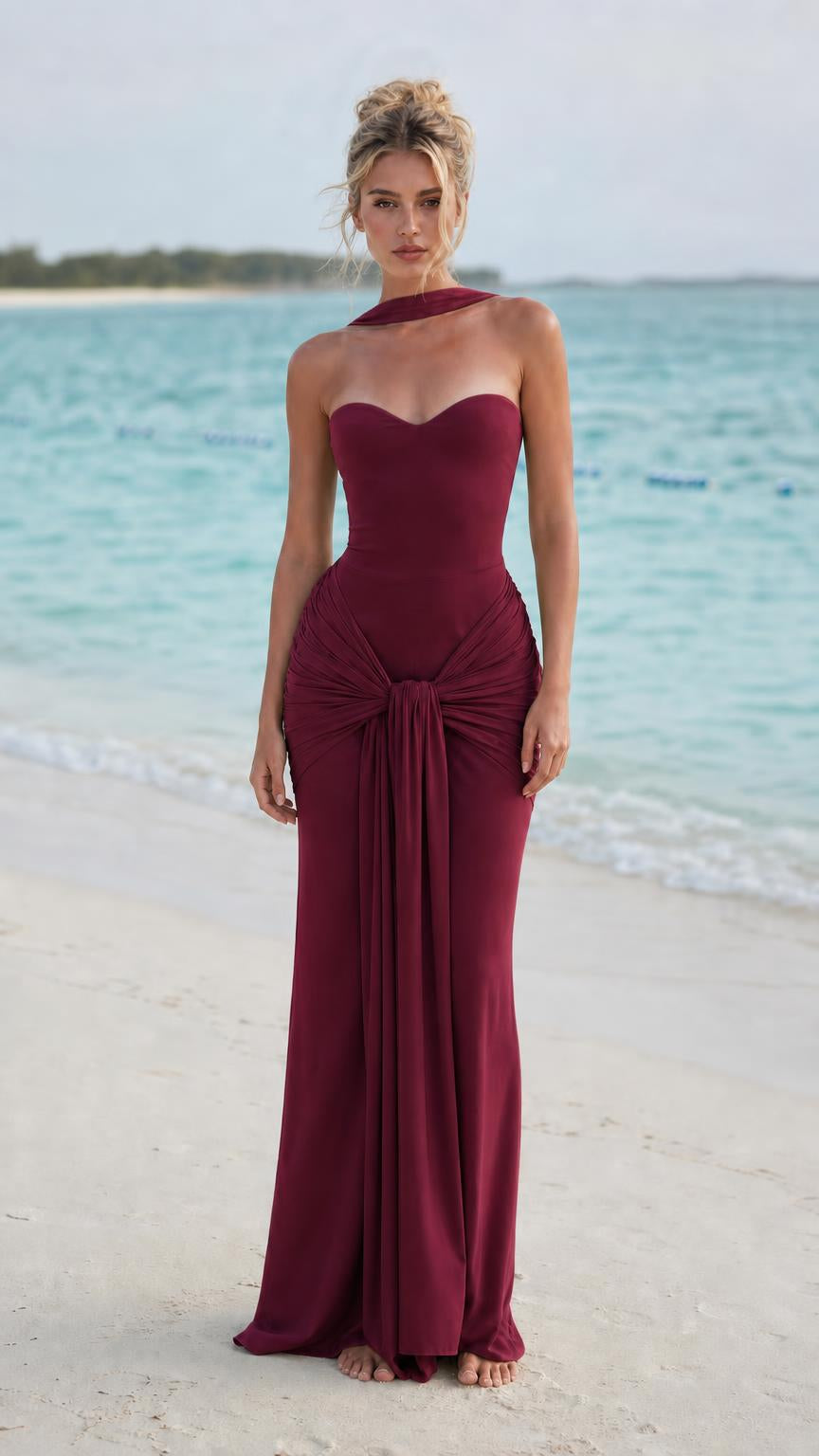Front view of burgundy knot-front strapless maxi dress