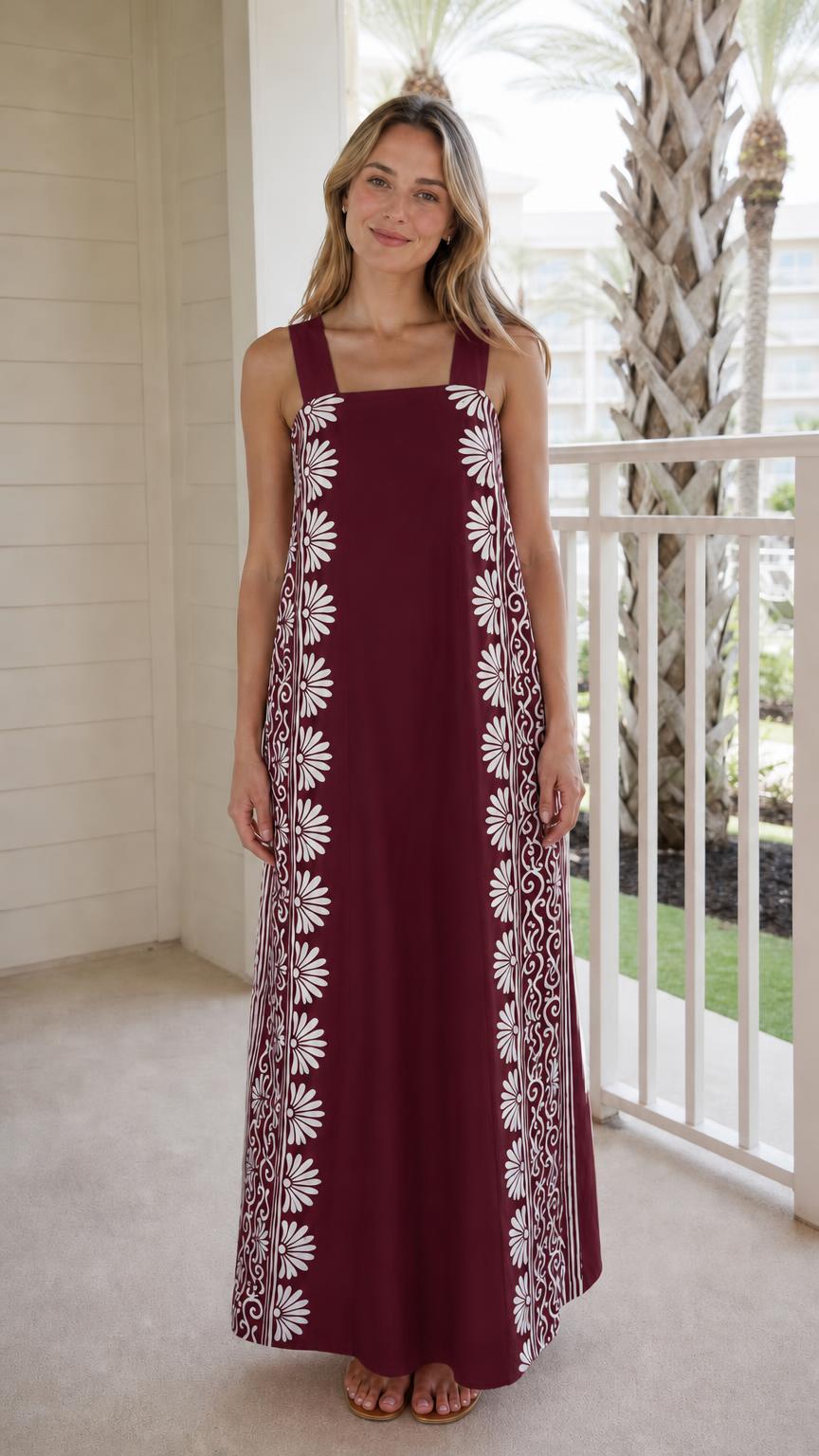 Woman wearing burgundy maxi dress with side print panels