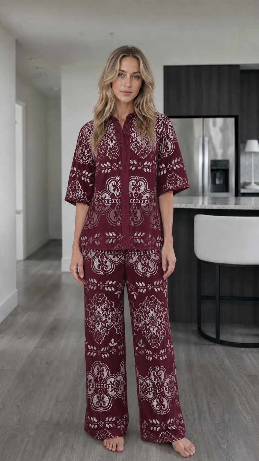 Woman wearing burgundy floral lace two-piece matching set