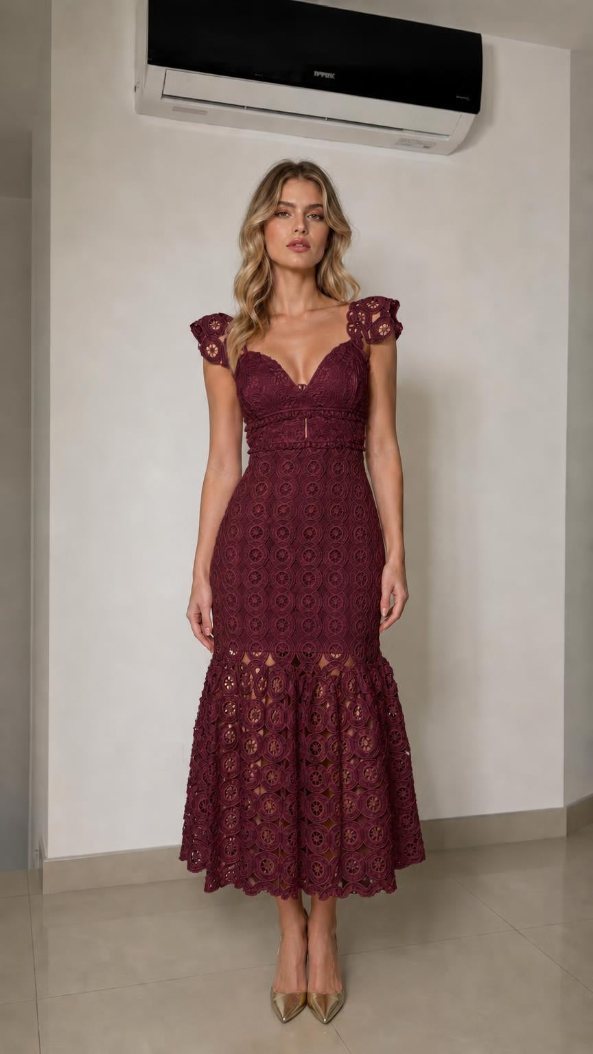 Front view of woman wearing burgundy lace mermaid midi dress