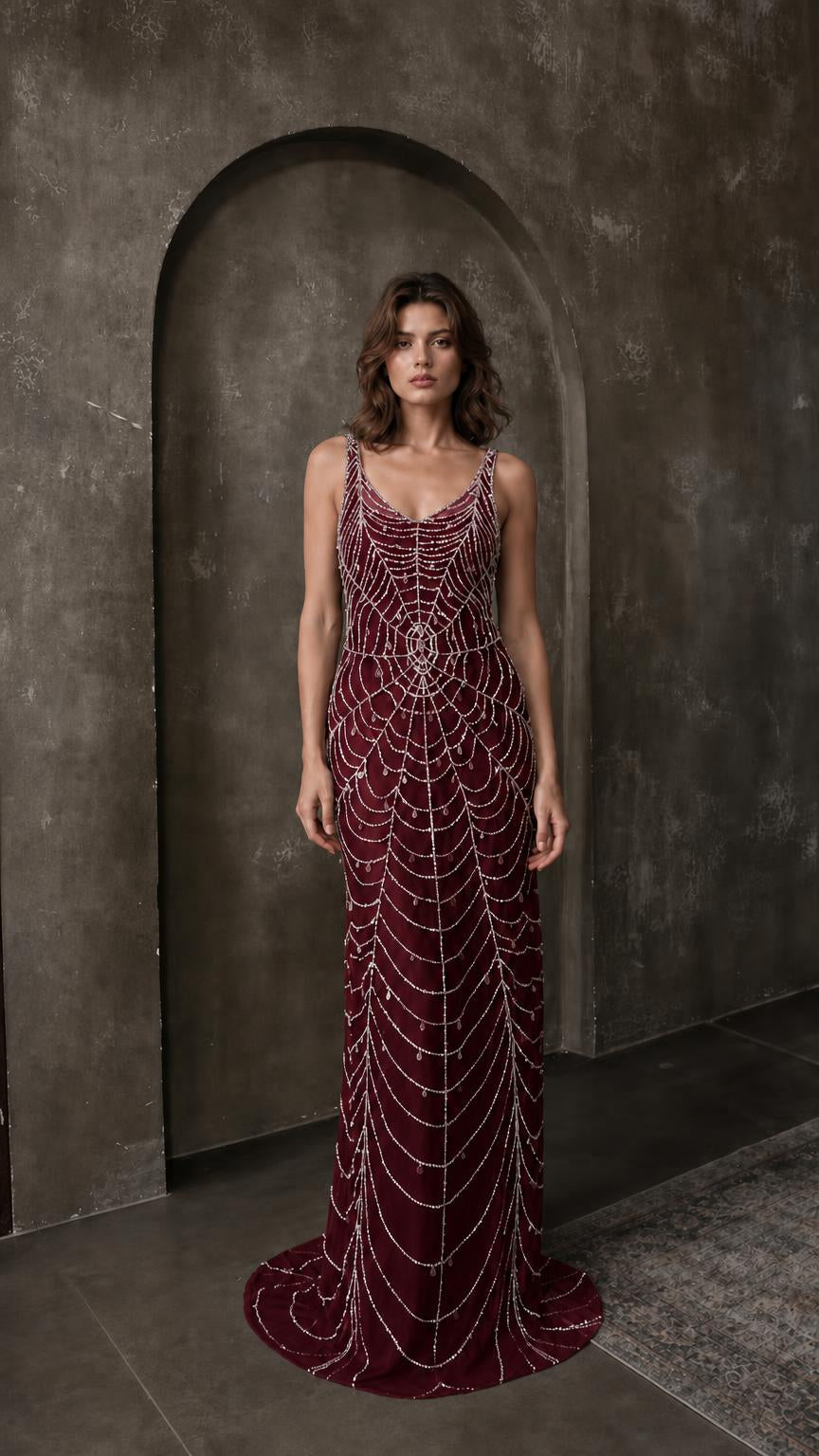 Front view of burgundy beaded evening maxi dress