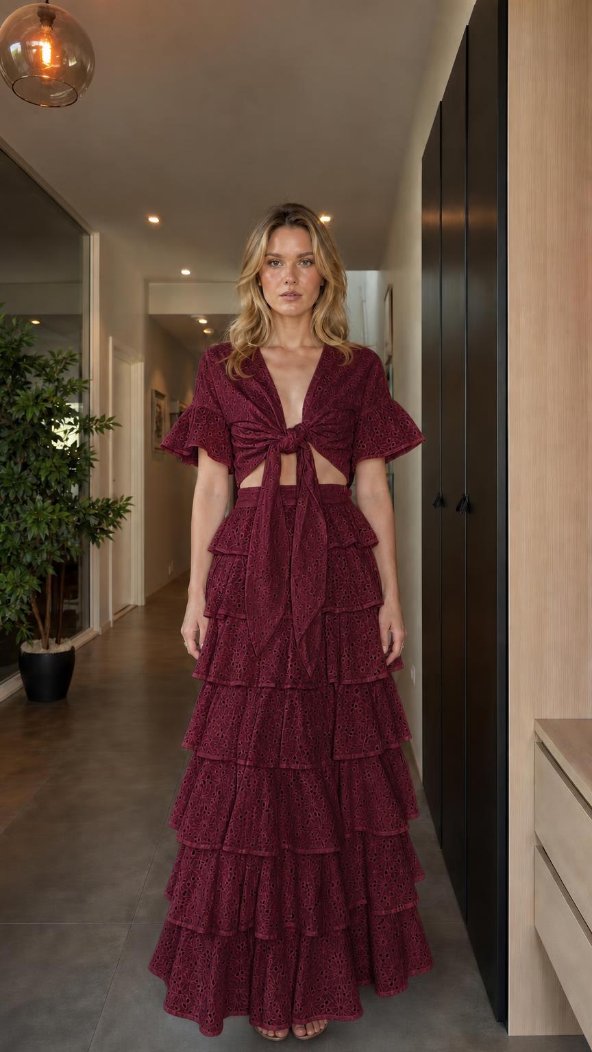 Model wearing burgundy eyelet embroidered two-piece set