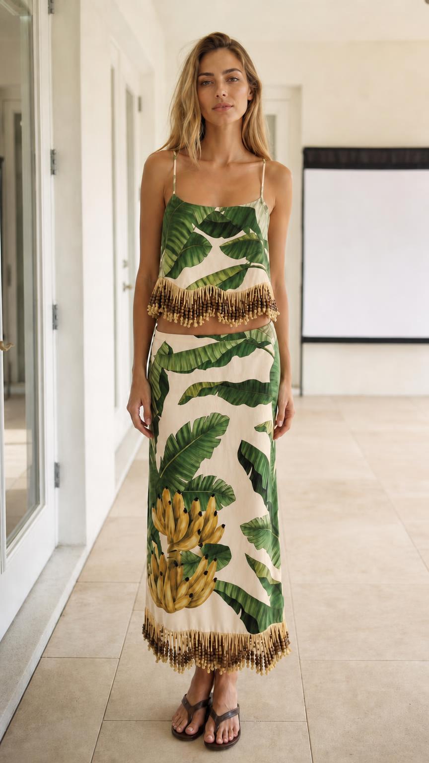 Model wearing ivory color variant of the tropical leaf print two-piece set